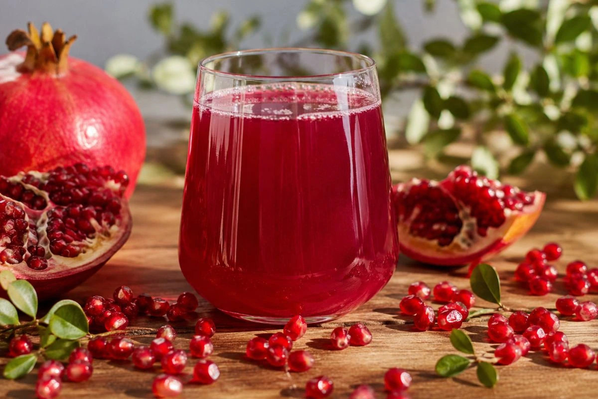 Fresh homemade pomegranate juice served in a glass
