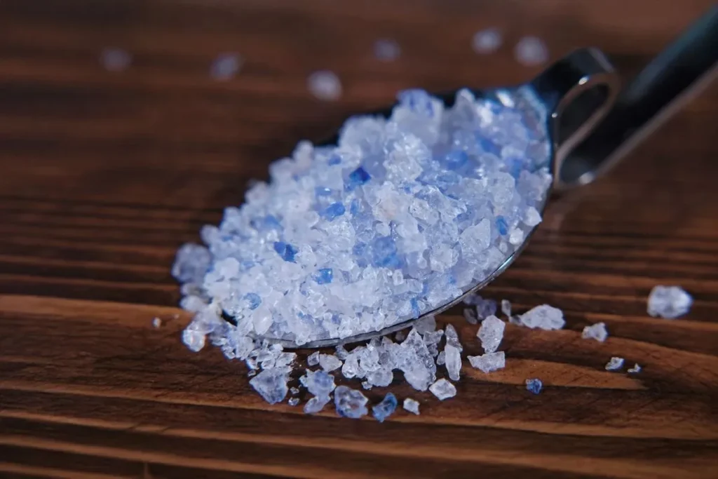 natural Persian blue salt crystals used in wellness drinks and gourmet recipes